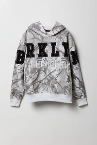 Haut à capuchon en molleton avec empiècement motif camouflage pour enfant