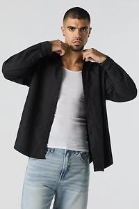 Haut texturé boutonné à manche longue