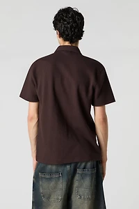Haut boutonné texturé