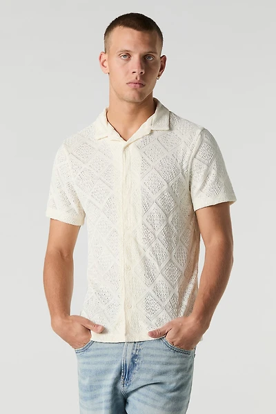 Haut boutonné en tricot ouvert à losange