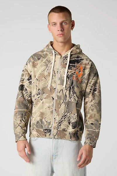 Haut à capuchon imprimé avec motif camouflage et fermeture glissière