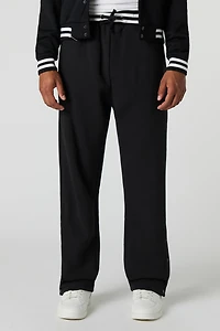Pantalon d'entraînement de style universitaire en molleton à taille coulissante