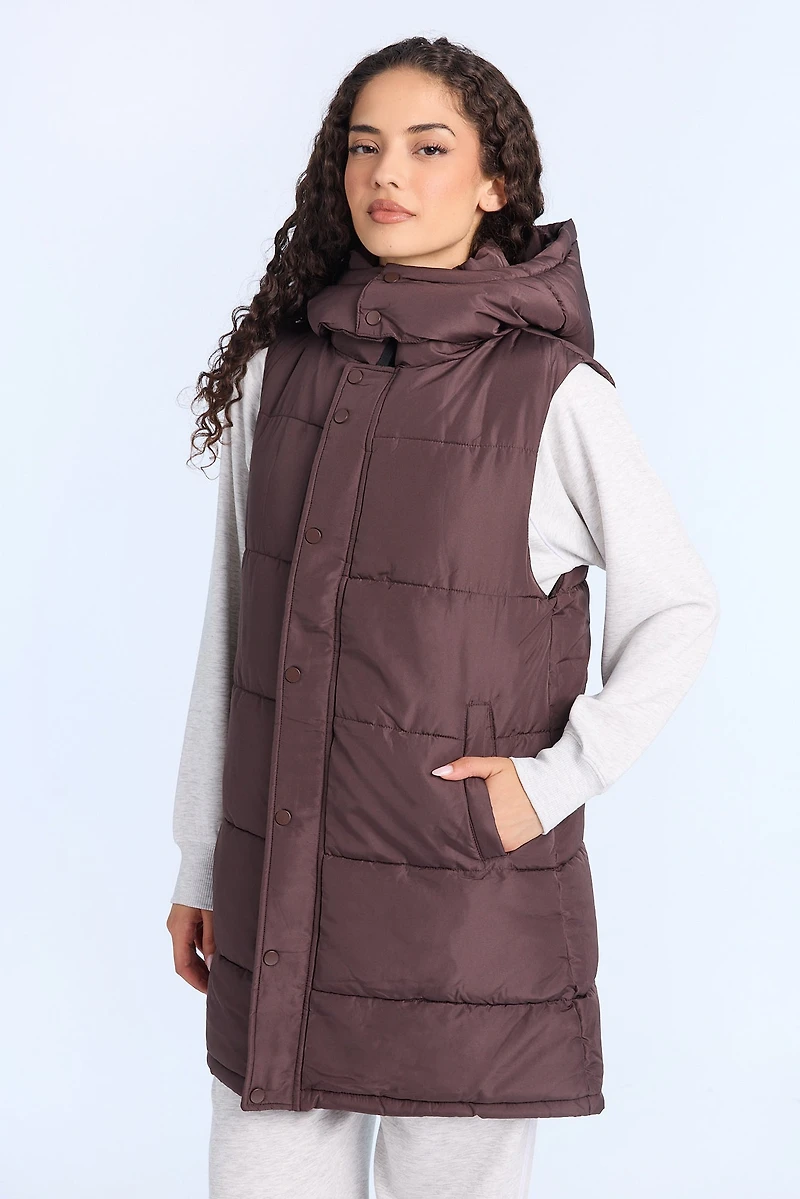 Gilet matelassé long à capuche
