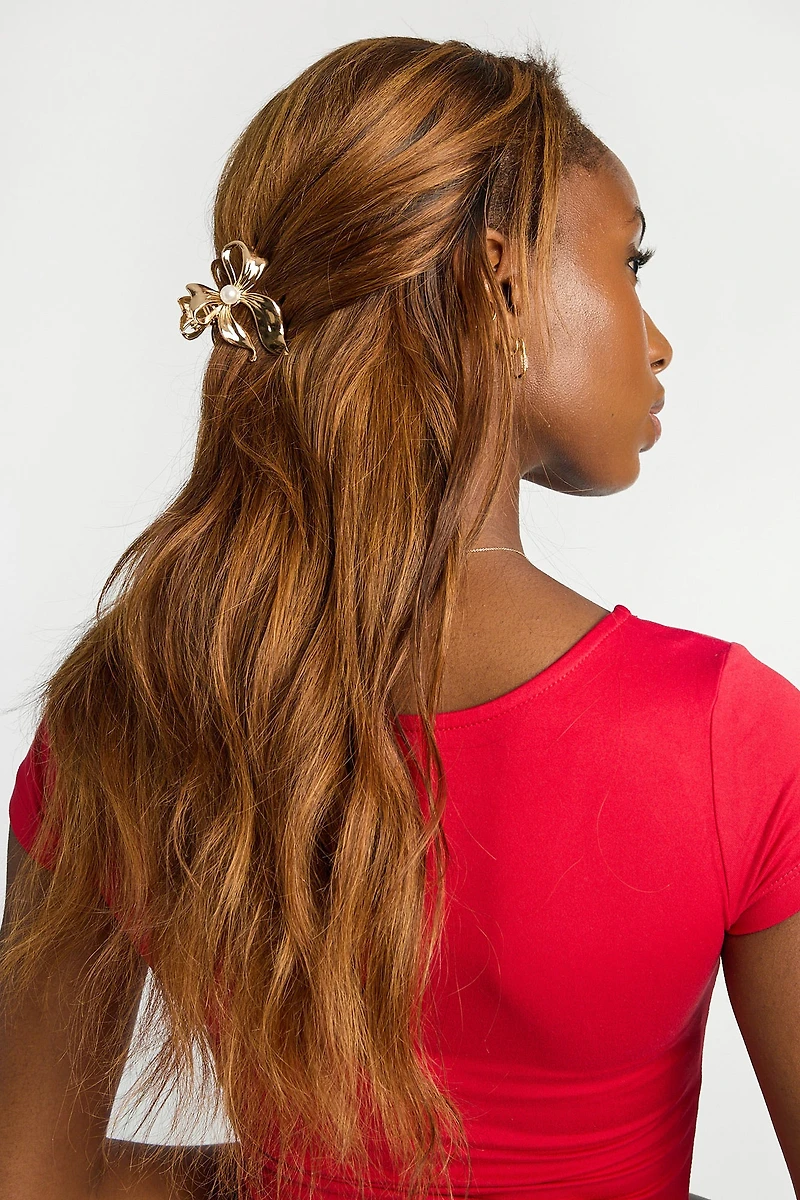 Pince à cheveux en forme de noeud