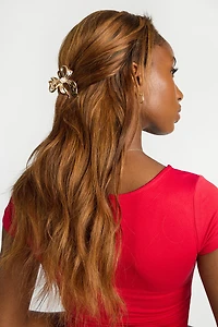 Pince à cheveux en forme de noeud