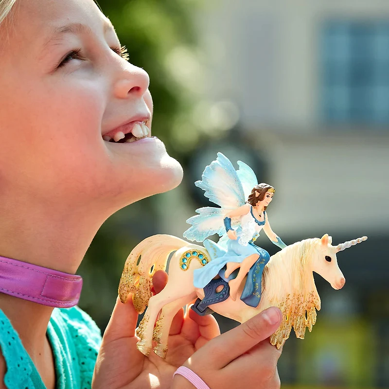 Eyela Riding On Golden Unicorn