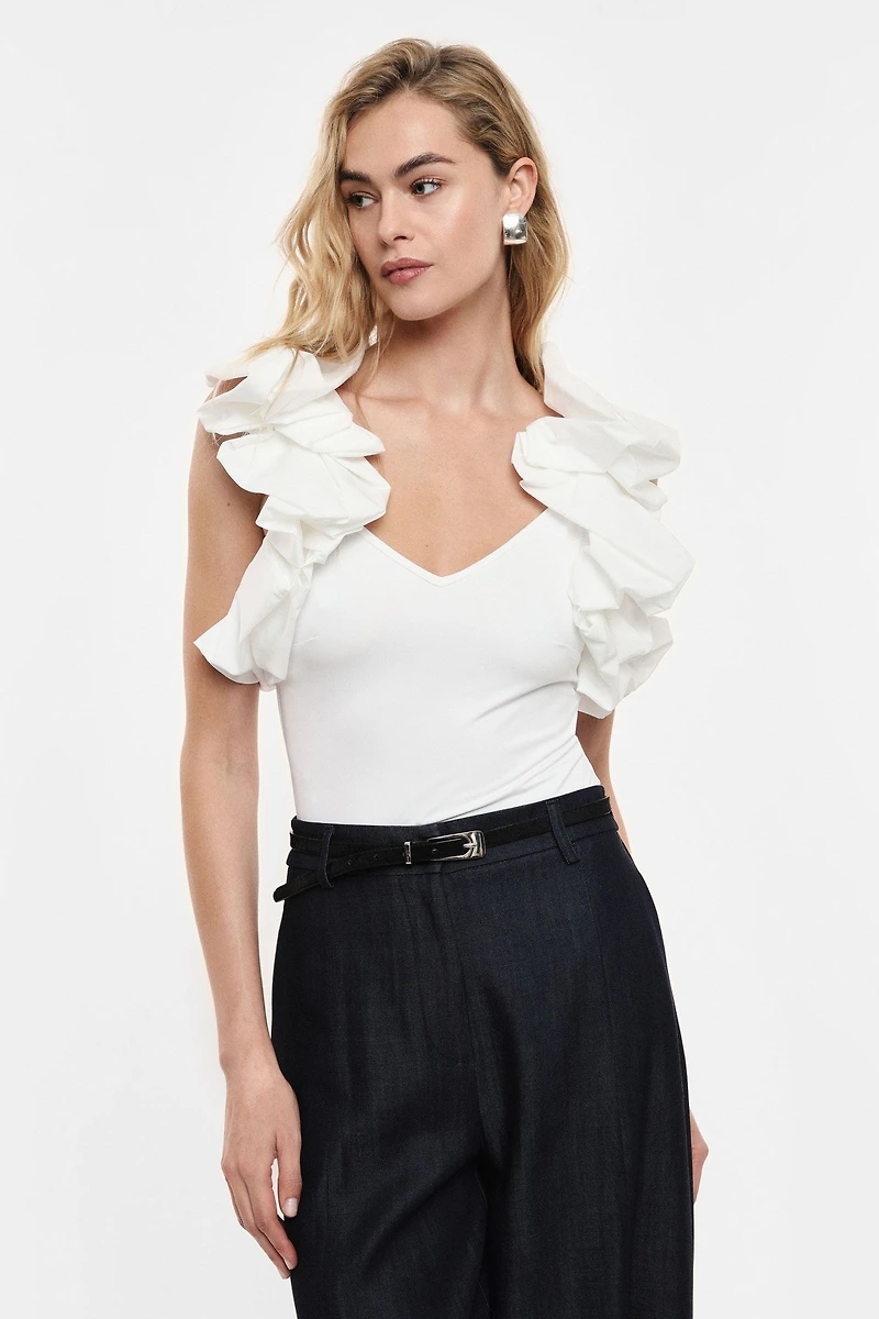 Sleeveless top sculptural ruffled shoulders