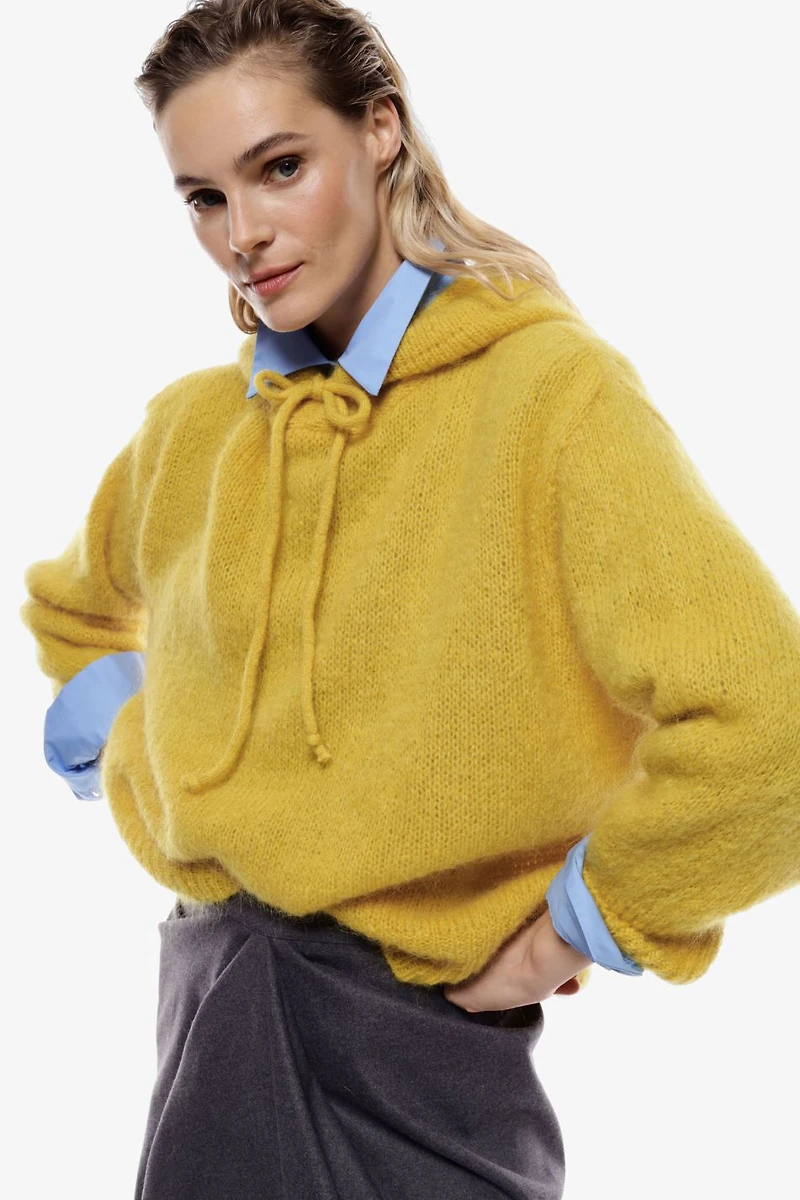 Pull à capuche tricotée