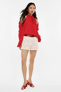 Oversized shirt floral accent