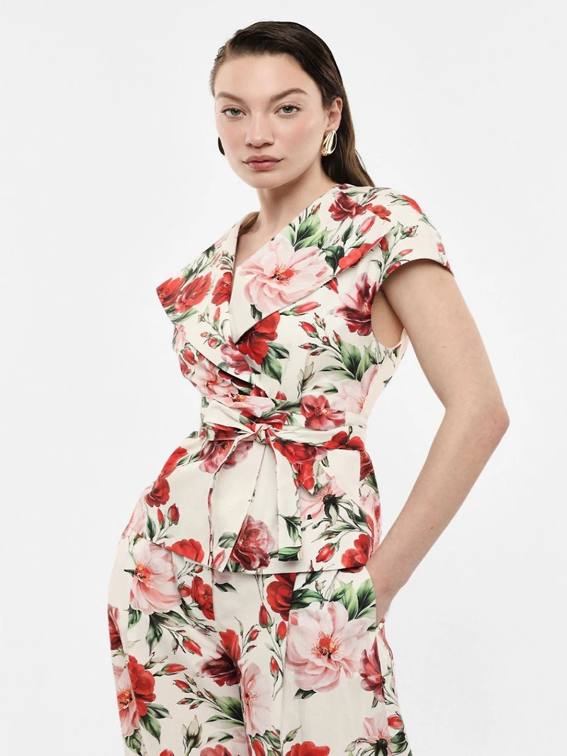 Vest with belt and floral print
