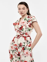 Vest with belt and floral print