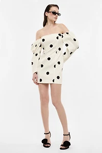 Short dress with polka dots and long sleeves