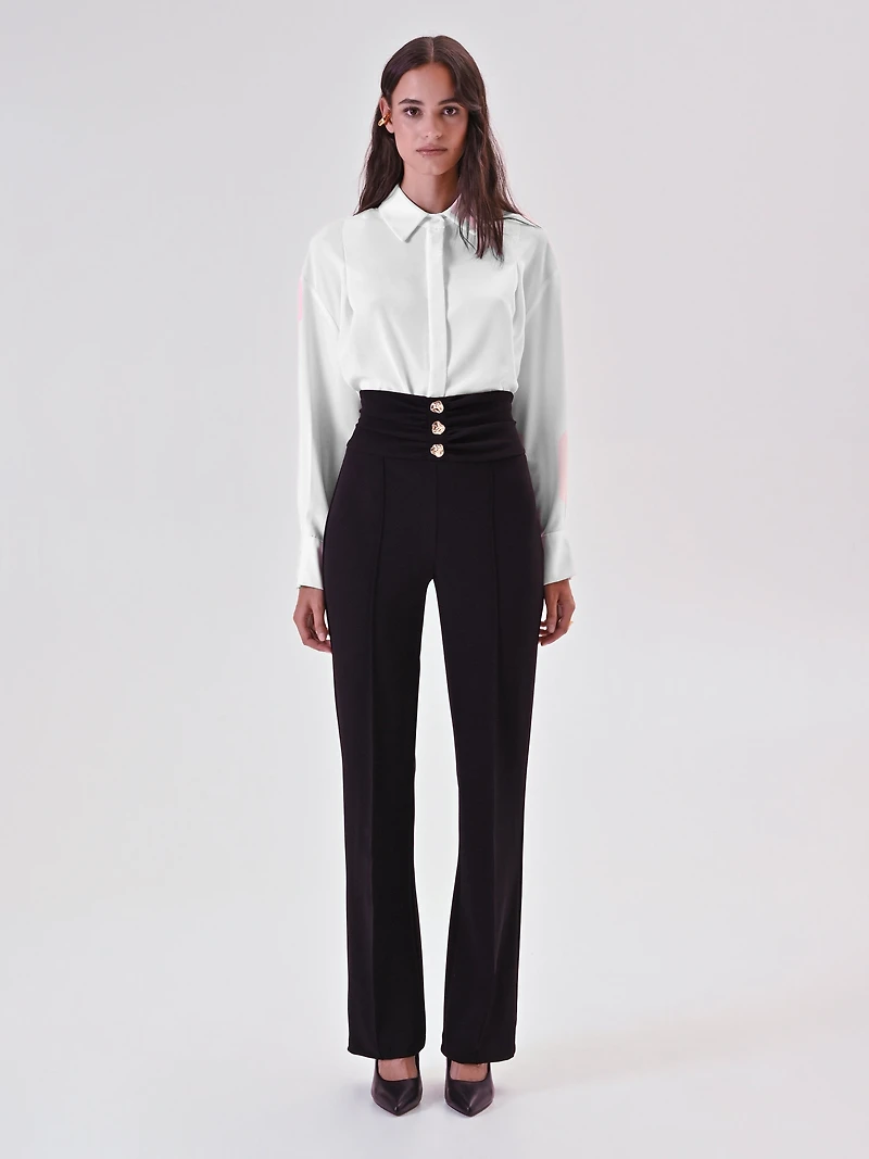 Pantalon à boutons décoratifs