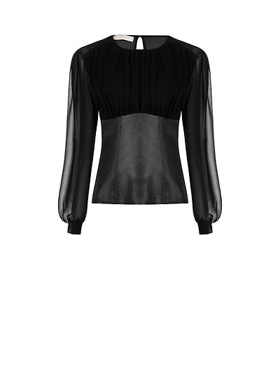 Chemisier en cuir orné de détails