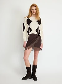 Mini-jupe portefeuille à franges