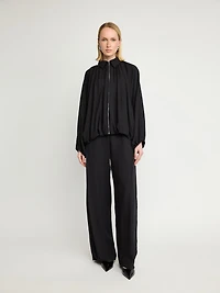 Veste zippée drapée à manches chauve-souris