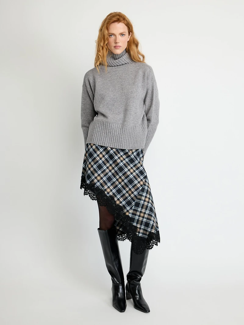 Pull col roulé en laine côtelée