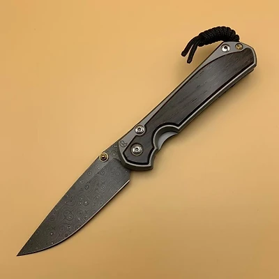 CRK - Large Sebenza 31 (Inlay Bog Oak) DAMASCUS RAINDROP Drop Point