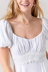 Jeannette Ruched Bow Back Mini Dress