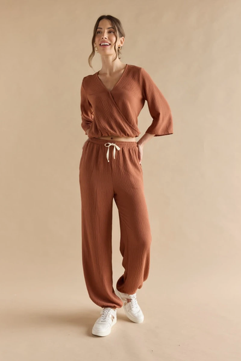 Lucy Elastic Hem Wrap Blouse Top