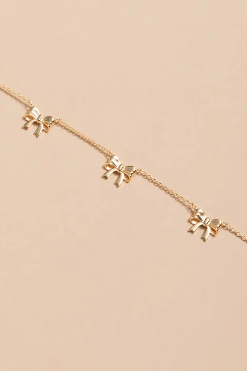 Sylvia Golden Bow Station Necklace
