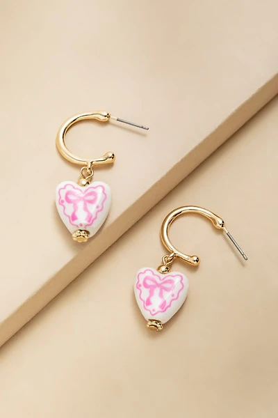 Sharon Bow On Ceramic Heart Huggie Earrings