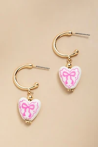 Sharon Bow On Ceramic Heart Huggie Earrings