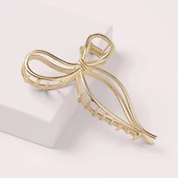 THE HAIR EDIT Gilded Bow Claw Clip