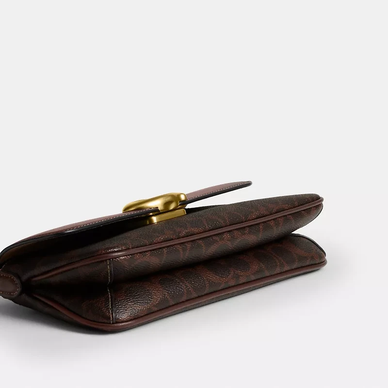 Jet Shoulder Bag In Signature Canvas