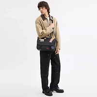 Hitch Messenger Bag In Signature Canvas With Patches
