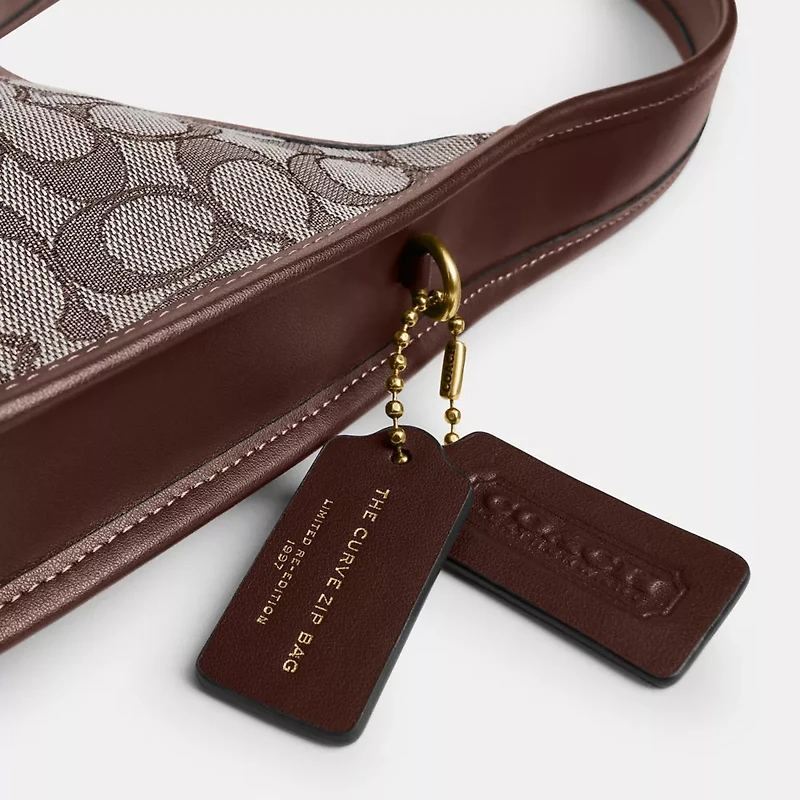 Curve Zip Bag In Signature Jacquard