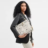 Coach X Peanuts Rogue Bag With Newspaper Print