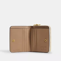 Coach X Peanuts Essential Billfold Wallet With Newspaper Print
