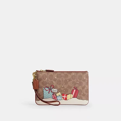 Essential Small Wristlet In Signature Canvas With Holiday Gifts