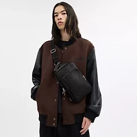 Felix Sling Bag In Signature Canvas