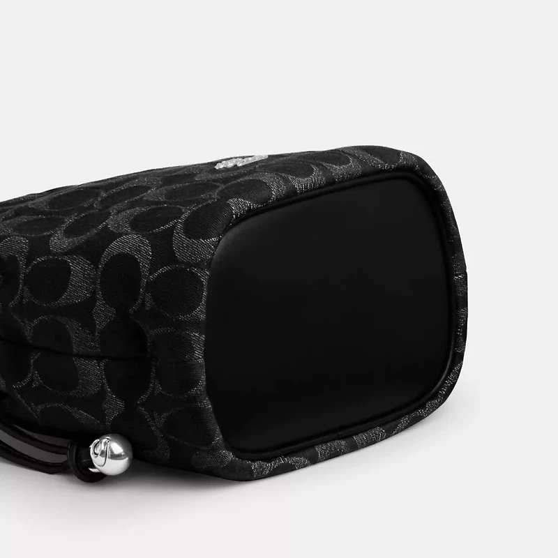 Faye Mini Drawstring Bag In Signature Denim