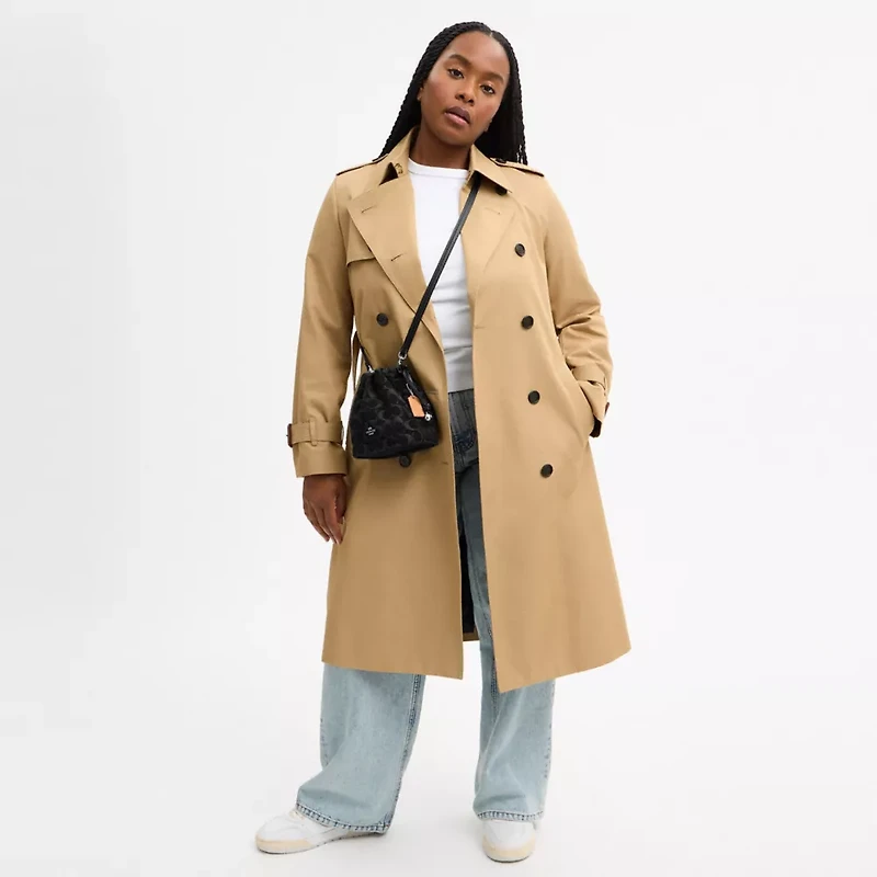 Faye Mini Drawstring Bag In Signature Denim