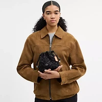 Faye Mini Drawstring Bag In Signature Denim