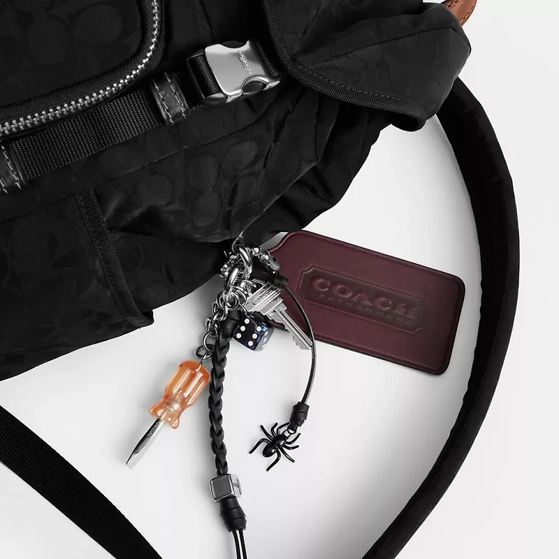 Logan Backpack In Signature Nylon With Charms