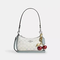 Teri Mini Crossbody Bag Signature Canvas