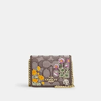 Mini Wallet On A Chain In Signature Jacquard With Floral Embroidery