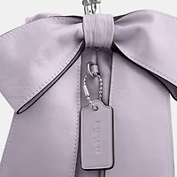 Faye Mini Drawstring Bag With Bows