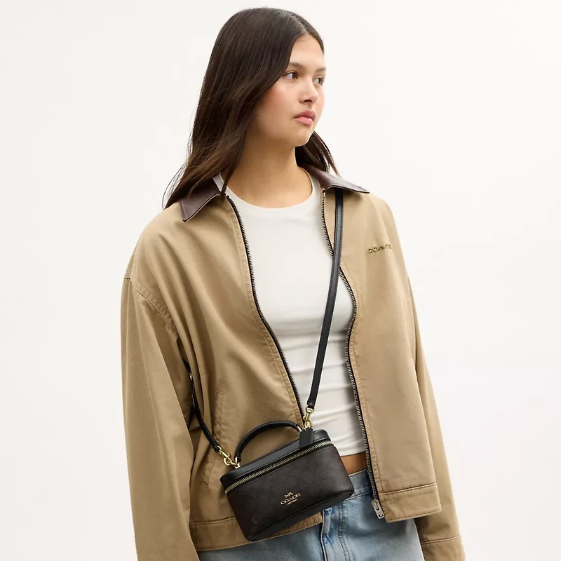 Rainer Crossbody Bag 18 Signature Canvas