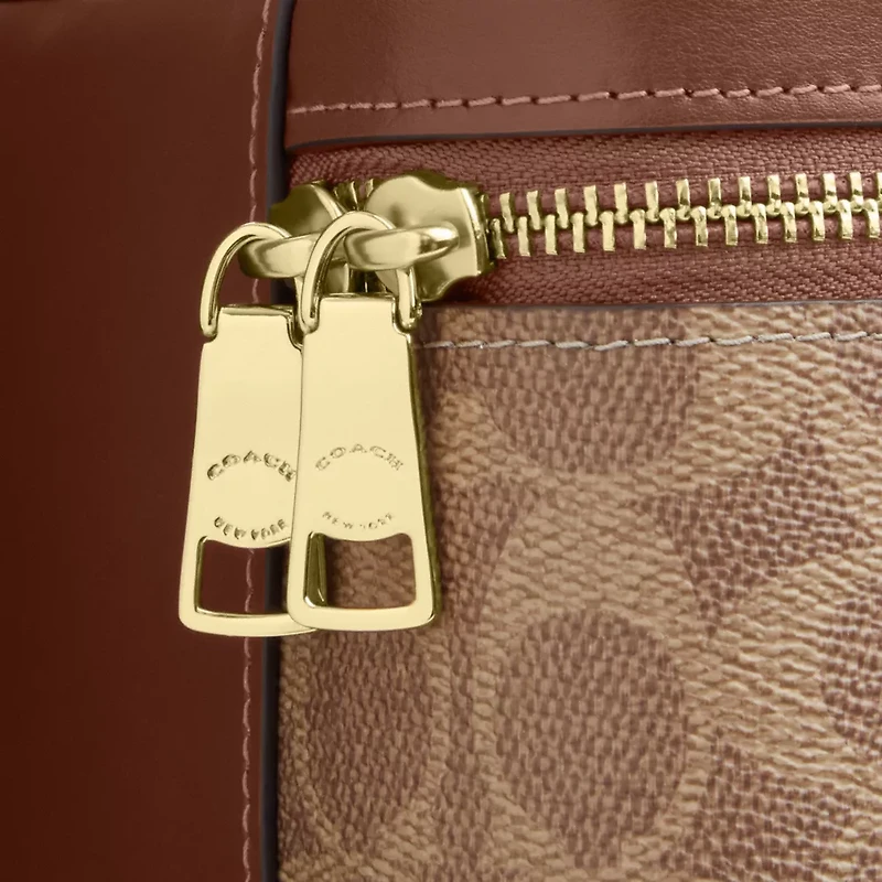 Rainer Crossbody Bag 18 Signature Canvas
