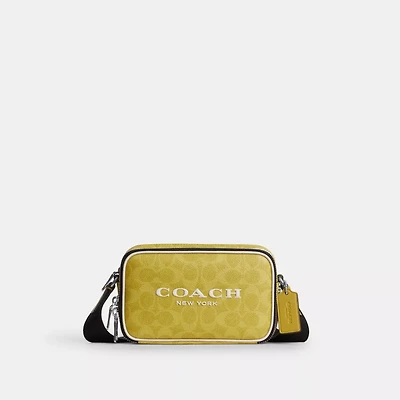 Colton Crossbody Bag 19 In Signature Canvas With Coach Graphic