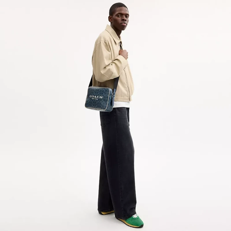 Colton Crossbody Bag 25 In Signature Canvas With Coach Graphic