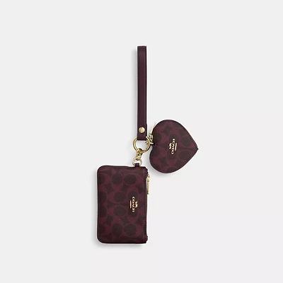 Wristlet And Heart Pouch In Signature Canvas