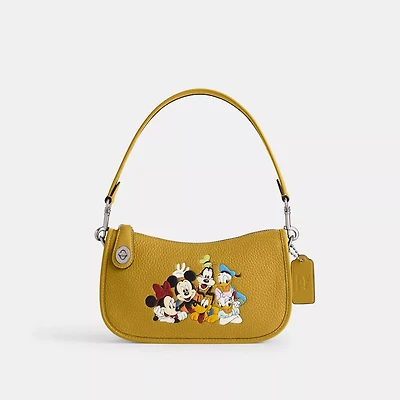 Disney X Coach Swinger Bag In Regenerative Leather With Mickey Mouse And Friends
