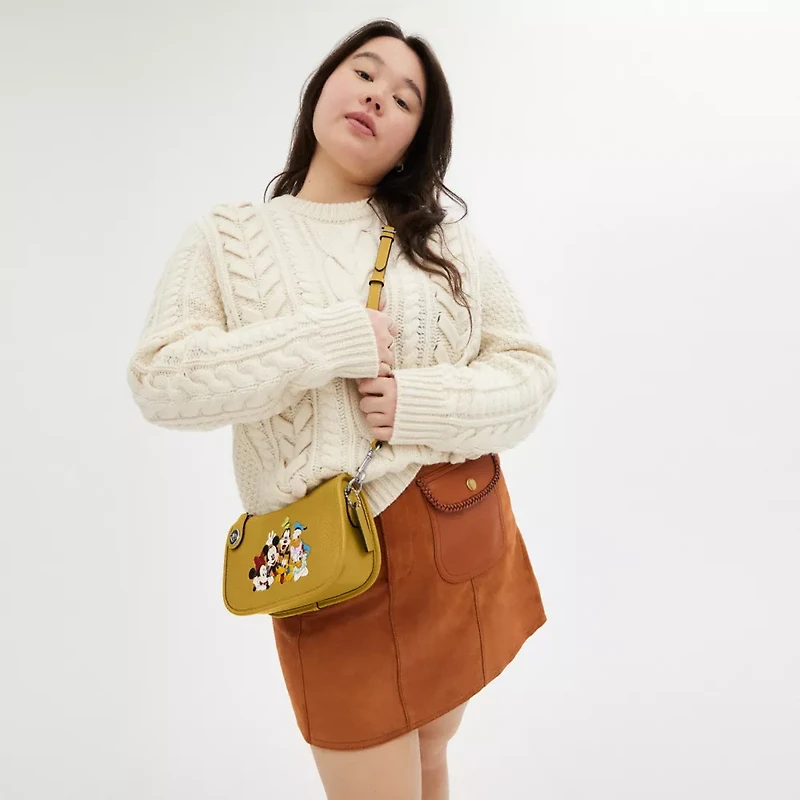 Disney X Coach Swinger Bag In Regenerative Leather With Mickey Mouse And Friends