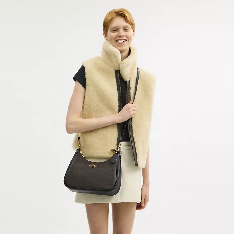 Teri Hobo Bag In Signature Canvas